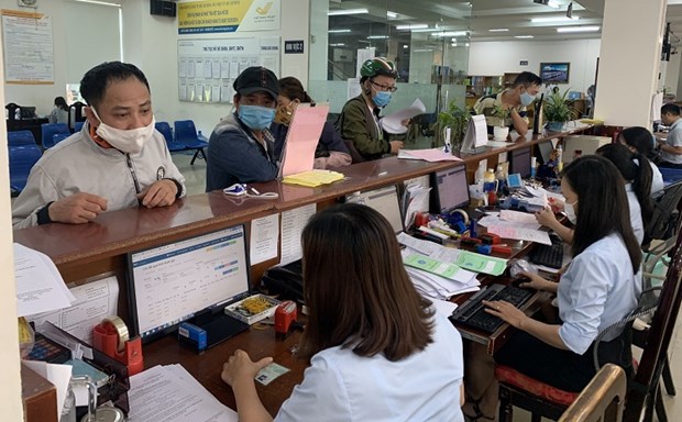 Unemployment insurance fund to soon complete payments for COVID-19-hit employees hinh anh 2