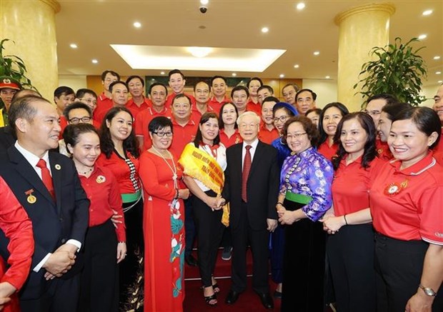 Party leader meets delegates to Red Cross Society's national congress hinh anh 2