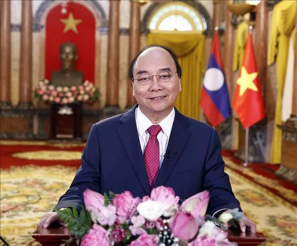 Lao media highlights remarks by Vietnamese, Lao leaders on special anniversary hinh anh 1