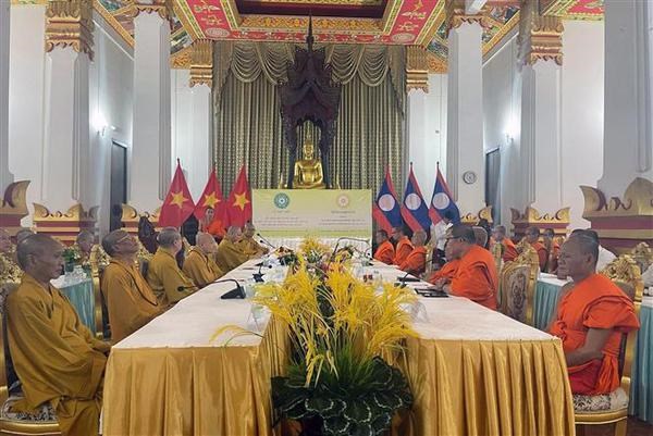 Buddhist Sanghas of Vietnam, Laos look to enhance cooperation hinh anh 1