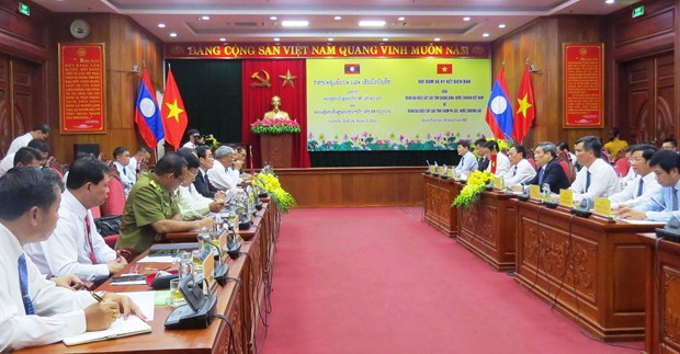Vietnamese, Lao localities cooperate in different fields hinh anh 1