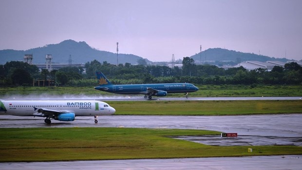 Vietnam Airlines restores operations at airports after typhoon hinh anh 1