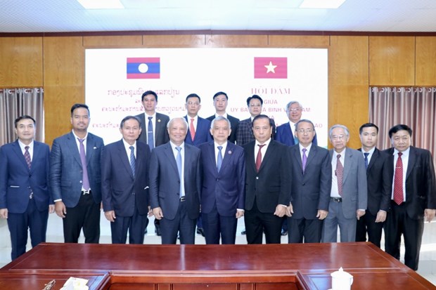 Vietnam, Laos’s peace committees eye stronger ties hinh anh 1