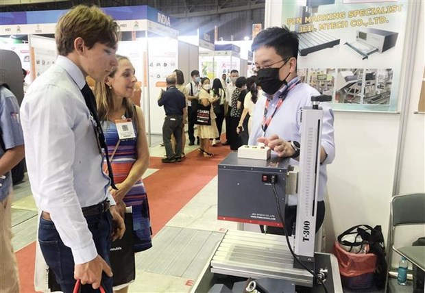 Machinery, supporting industry expos gather 250 brands hinh anh 2