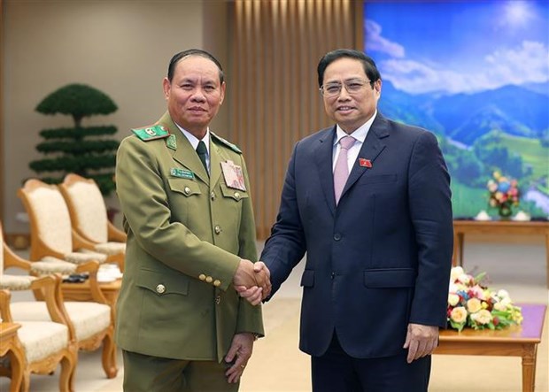 PM receives Lao Deputy PM and Minister of Public Security hinh anh 1
