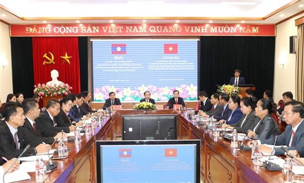 Vietnam, Laos step up cooperation in mass mobilisation hinh anh 1