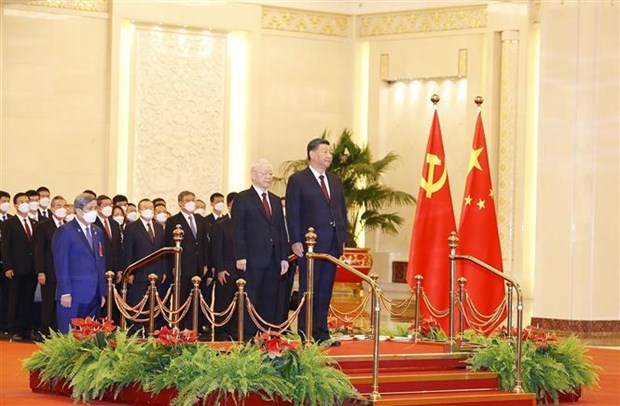 Welcome ceremony with cannon salute held for Vietnamese Party leader in China hinh anh 2
