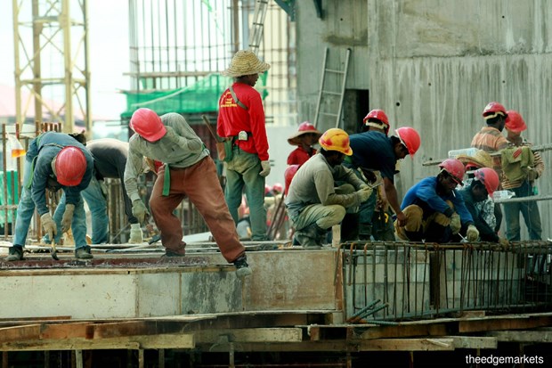 Malaysia urges speeding up foreign worker hiring hinh anh 1