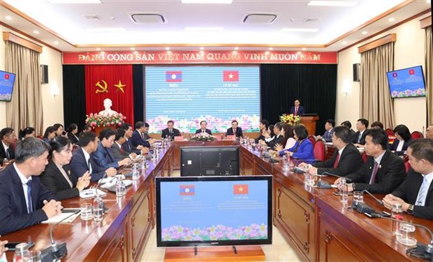 Vietnam, Laos share experience in mass mobilisation hinh anh 1