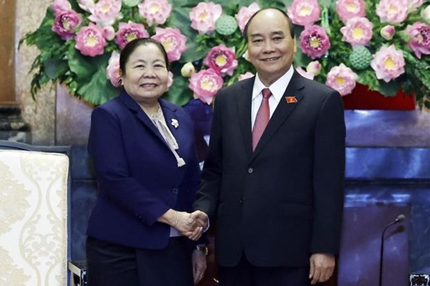 President hosts Lao Party official hinh anh 2