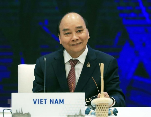 President Nguyen Xuan Phuc attends dialogue with APEC leaders hinh anh 1