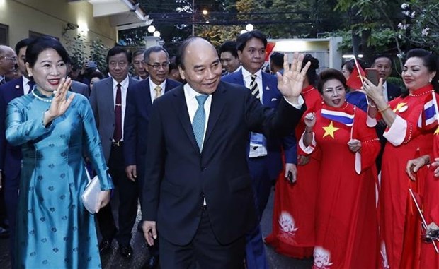 President visits Vietnamese in Thailand hinh anh 1