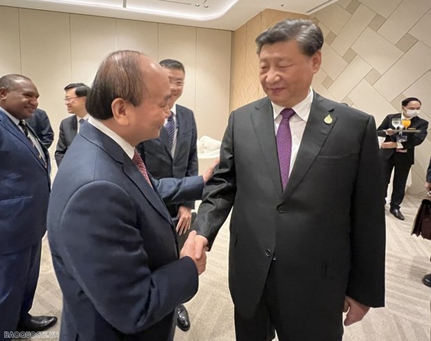 President meets top Chinese leader in Bangkok hinh anh 1
