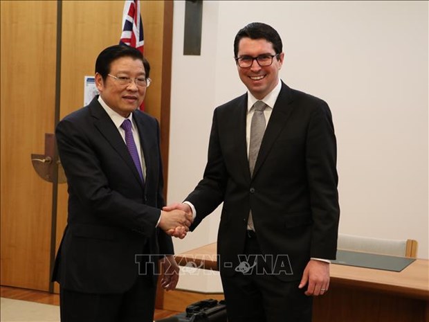 Party delegation pays working visit to Australia hinh anh 1