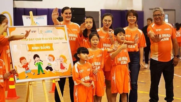 Football festival spreads message of ending violence against women, children hinh anh 1