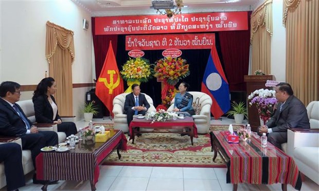 HCM City leader offers greetings on Lao National Day hinh anh 1