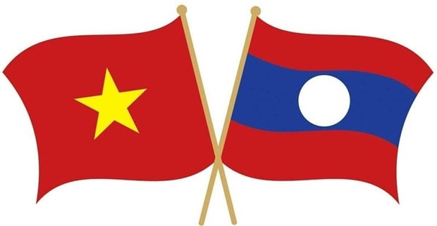 Top leaders congratulate Laos on National Day hinh anh 1
