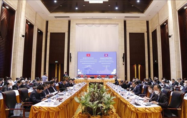 Vietnamese, Lao parties hold ninth theoretical workshop hinh anh 1