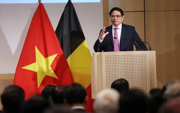 PM menghadiri Forum Bisnis Vietnam-Belgia di Brussels hinh anh 1
