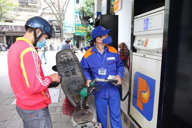 Petrol prices continue falling hinh anh 1