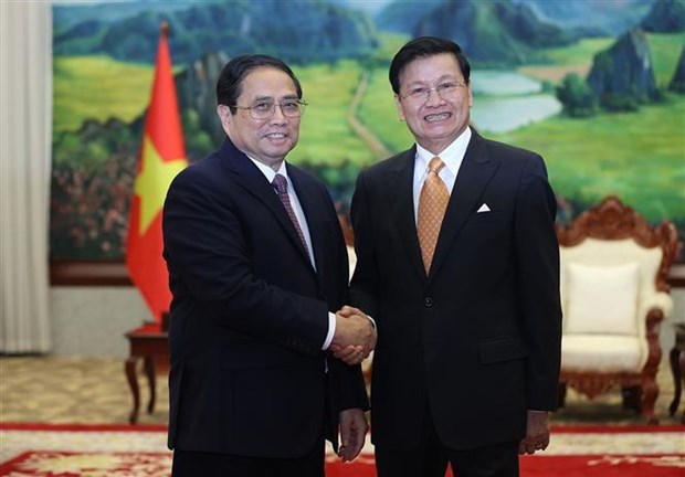 PM Pham Minh Chinh meets with Party General Secretary, President of Laos hinh anh 1