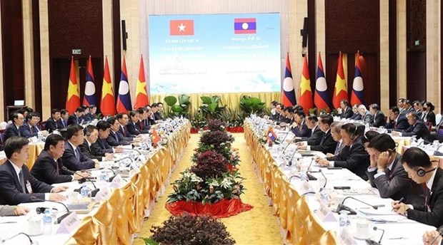 Vietnamese, Lao PMs co-chair Inter-Governmental Committee’s meeting hinh anh 1