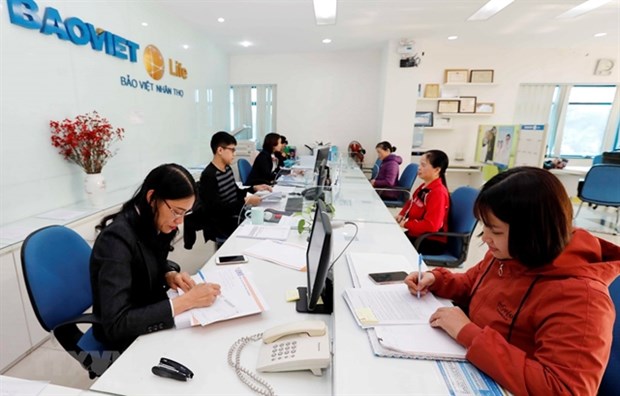Insurance companies benefit from interest rate hike in 2023 hinh anh 1