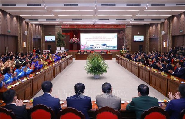Party chief extends Tet greetings to Hanoi's officials and people hinh anh 3