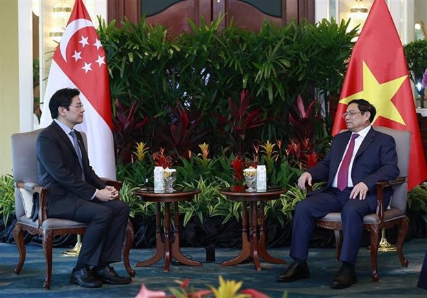 Prime Minister Pham Minh Chinh meets with Singaporean Deputy PM hinh anh 2