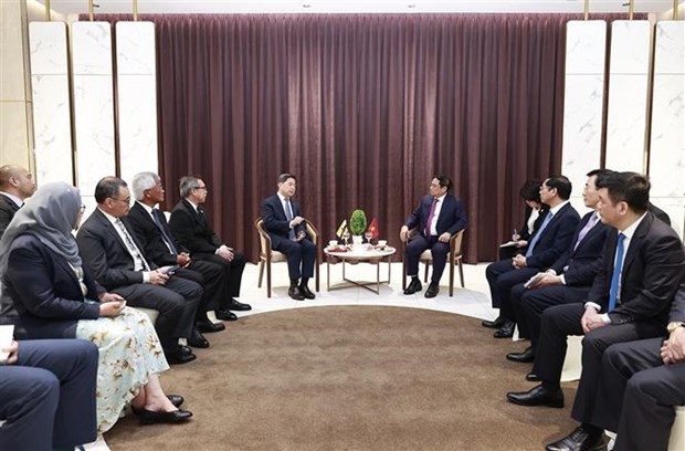 PM hosts Brunei Minister of Finance and Economy hinh anh 1