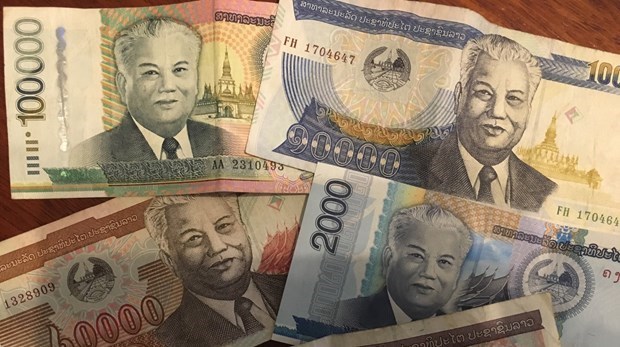 Lao central bank striving to stabilise local currency hinh anh 1