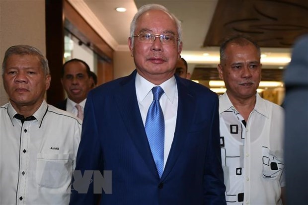 Former Malaysian PM Najib Razak acquitted of audit tampering hinh anh 1