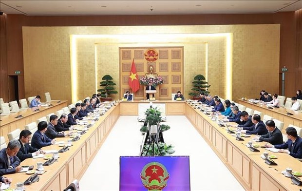 PM meets with chiefs of Vietnamese representative offices abroad hinh anh 1
