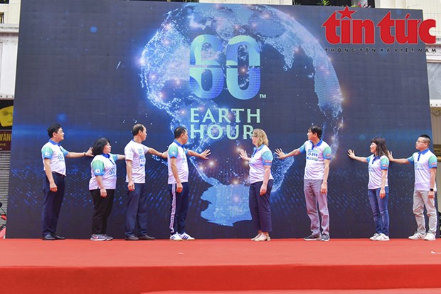 Over 1,000 people run in response to Earth Hour 2023 in Hanoi hinh anh 1