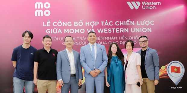 MoMo, Western Union partner for money transfer in Vietnam hinh anh 1