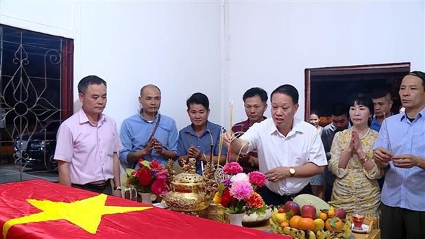 Overseas Vietnamese commemorate fallen soldiers in Laos hinh anh 1