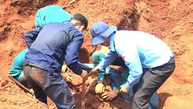 Remains of 20 fallen soldiers found in a hamlet in Binh Phuoc hinh anh 1