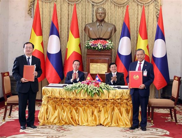 President holds talks with Party General Secretary, President of Laos hinh anh 4