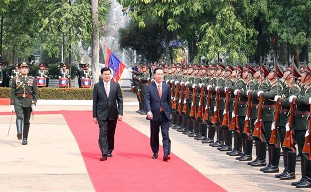 President holds talks with Party General Secretary, President of Laos hinh anh 3