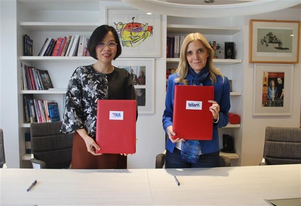 Vietnamese, Argentine news agencies sign cooperation agreement hinh anh 1