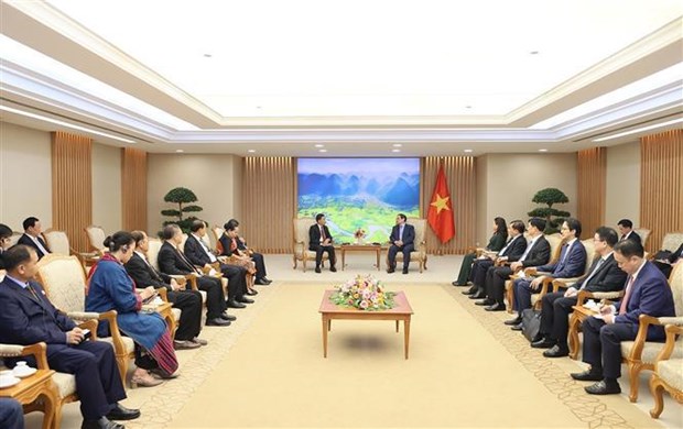 PM receives leader of Lao Front for National Construction hinh anh 1
