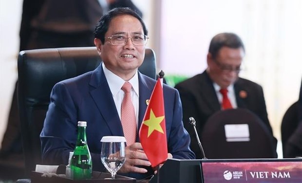 PM attends dialogues on ASEAN Community hinh anh 1