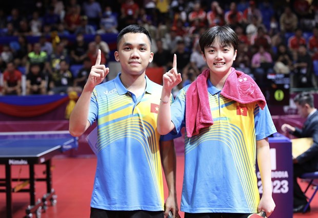 32nd SEA Games: Historic gold for Vietnam in mixed doubles table tennis hinh anh 1