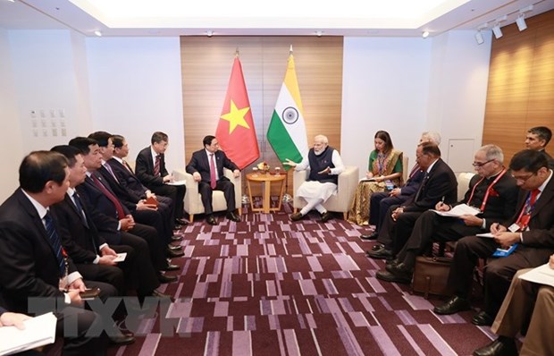 PM meets Canadian, Indian, Comoros leaders hinh anh 3