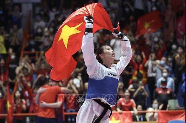 Vietnamese Taekwondo fighter beats defending champion at world championships hinh anh 1