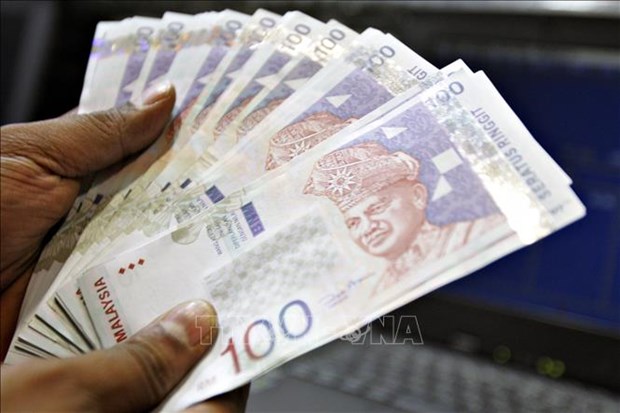 Malaysia ringgit at seven-month low hinh anh 1