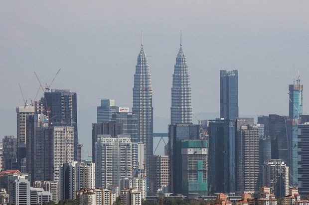 Malaysia’s GDP growth eases in Q2 hinh anh 1