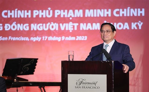 PM meets Vietnamese community in US hinh anh 1