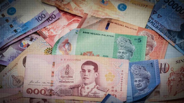 Malaysian, Thai economies suffer as currencies slide hinh anh 1