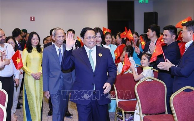 PM meets with overseas Vietnamese in Saudi Arabia hinh anh 1